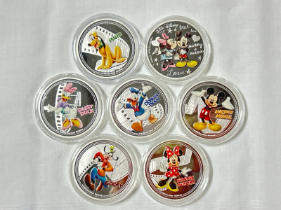 (7) Disney "Characters" Silver Plated Collectible Coins