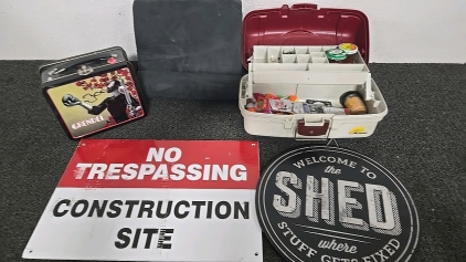 (1) Grendel Tin Lunch Box (1) Tin Shed Sign (1) No Trespassing Sign (1) Foam Tablet Holder (1) Tackle Box with Some Tackle in it