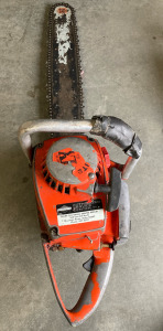 Orange HOMELITE Chainsaw