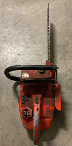 Orange HOMELITE Chainsaw