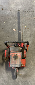 Long Homelite Red Chainsaw