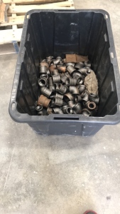 Black Bin Of Iron Pipes