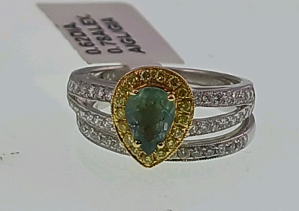 18K Two Tone Natural Alexandrite Chrysoberyl (0.78ct) and Colorless/Fancy Yellow Diamond (0.62ct) Ring. (Size 6.5) A Pear Modified Brilliant Cut Natural Alexandrite Chrysoberyl Gemstone. Retail Value $19,860