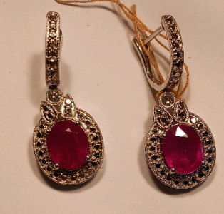 Ruby Corundum Oval Faceted (7.35ctw) Surrounded Round Brilliant Cut Diamonds (.19ctw) 925 Silver Earrings