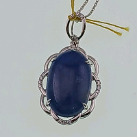 Platinum Natural Burmese Sapphire Corundum (19.15ct) Diamond (0.14ct) Pendent. Oval Cabochon Cut Natural Blue Burmese Sapphire Corundum Gemstone Retail $11,540