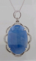 Platinum Natural Burmese Sapphire Corundum (19.15ct) Diamond (0.14ct) Pendent. Oval Cabochon Cut Natural Blue Burmese Sapphire Corundum Gemstone Retail $11,540 - 5