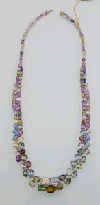 Platinum Multi Color Sapphire Necklace. 127 Genuine Unheated Sapphires (app 83.44ct) Necklace measures 18.5in in Length with Tension Lock Clasp Retailer Value $293,800.00