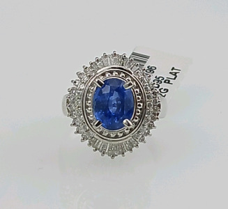 Platinum Natural Corundum and Diamond Ring (size 6) Oval Brilliant Cut Natural Blue Sapphire Corundum Gemstone (2.69ct) with Baguette and Round Brilliant Cut Diamonds (0.71ct) Retail Value $21,570.00