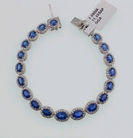 Platinum Natural Sapphire Corundum and Diamond Bracelet. Oval Brilliant Cut Natural Sapphire Corundum Gemstones (11.49ct tw) Round Brilliant Cut Diamonds Accent Braclet around Canter Gemstones (2.99ct tw) Retail Value $39,740.00