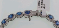 Platinum Natural Sapphire Corundum and Diamond Bracelet. Oval Brilliant Cut Natural Sapphire Corundum Gemstones (11.49ct tw) Round Brilliant Cut Diamonds Accent Braclet around Canter Gemstones (2.99ct tw) Retail Value $39,740.00 - 2