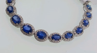 Platinum Natural Sapphire Corundum and Diamond Bracelet. Oval Brilliant Cut Natural Sapphire Corundum Gemstones (11.49ct tw) Round Brilliant Cut Diamonds Accent Braclet around Canter Gemstones (2.99ct tw) Retail Value $39,740.00 - 3