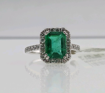 Platinum Emerald and Diamond Ring (size 6.5) Rectangle Cut Natural Emerald (2.38ct) 30 Bead Set Round Brilliant Cut Diamonds (0.66ct) Retail Value 19,750.00