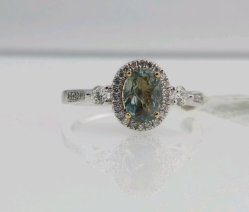 18K Yellow Gold Alexandrite and Diamond Ring (size 6.5) Marked Oscar Friedman Oval Genuine GIA Certified Alexandrite Center Stone (0.73ct) 34 Round Natural Brilliant Cut Diamonds (0.26ct) Retail Value $10,903.00