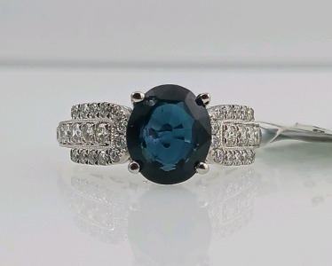 Platinum Natural Sapphire Corundum and Diamond Ring (size 6.5) Oval Brilliant Cut Natural Sapphire Corundum Gemstone (2.59ct) 36 Round Brilliant Cut Diamonds (0.51ct) Retail Value $10,260.00