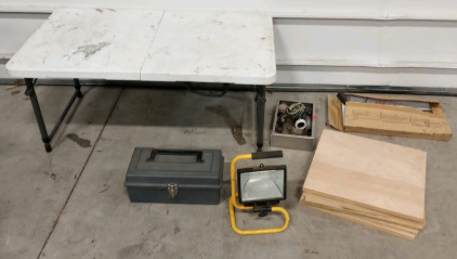 (1) Foldable Table (24 x 41 1/2 x 19) (1) Tool Box (1) Container Of Plumbing Supplies (6) Wood boards (15 1/2 x 17 1/2)(1) Work Light and more (SP 12)