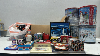 (4) Large Penguin Themed Tins, Assortment of Various Glass and Ceramic Penguins, (2) Penguin Statues, Black and White Cat Statue, Large Collection of Penguin Themed Items: Teapots, Candle Critters, Tins, Coffee Mugs, and More