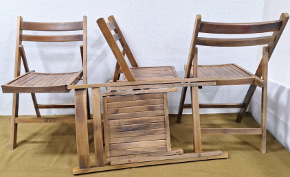 (4) Wood Folding Chairs. In Specialty on W