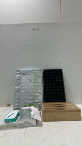 (3) 10 pc. Seed Starter Kits, (1) Bamboo 3-Slot Wrap Dispenser, (1) Quip Sonic Toothbrush (2) Sapine Hanging Metal Artificial Plant Holder