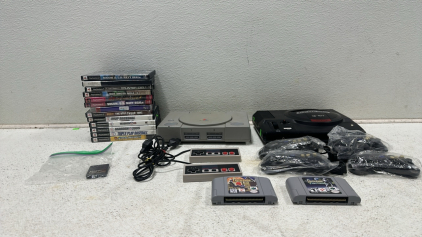 Sony Playstation with Memory Card, Sega Genesis 16-Bit, (4) Sega Genesis Controllers, (13) Various PS2 Games, (2) Nintendo 64 Games, (2) NES Controllers