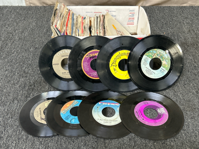 Small Box Of 45 RPM Récords