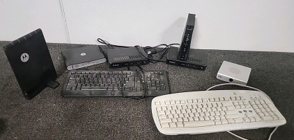 2 Keyboards,Motorola Modem,2 RCA Modems,Access H.D., Unidentified Modem