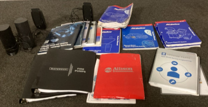 VARIETY OF AUTOMOTIVE STUDENT MANUALS, 2 SETS OF COMPUTER SPEAKERS.