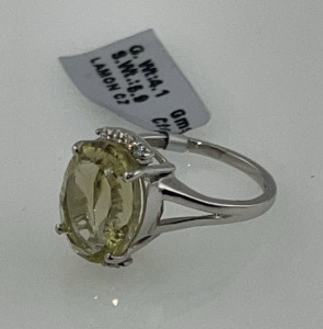 8.1ct. Oval Cut And Faceted Lemon CZ Gemstone And .925 Silver Ring Size 6-1/2