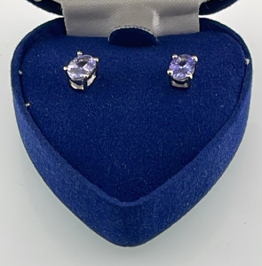 Oval Cut And Faceted Amethyst And Silver Earrings