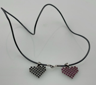 Pink And Black Cut And Faceted Gemstone And Silver Pendant Neclace