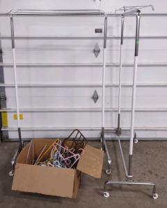 (2) Rolling Clothes Rack w/ Box Full Of Coat Hangers (20+)