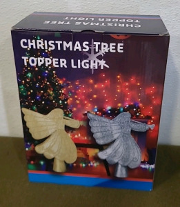 (1) Angel Christmas Tree Topper Light, (1) Glass Angel W/Rose Figurine, (1) Tree Skirt & (1) Box Of Assorted Amazon Overstock/ Returns