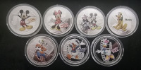 (7) Disney Silver Plated Character Collector Coins