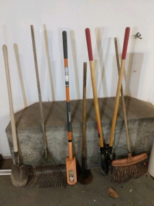 Garden Tools Lot - (1) Shovel (1) Leaf Rake (1) Post Hole Digger (1) Flat Shovel (1) Garden Hoe (1) Bow Rake (room 2)