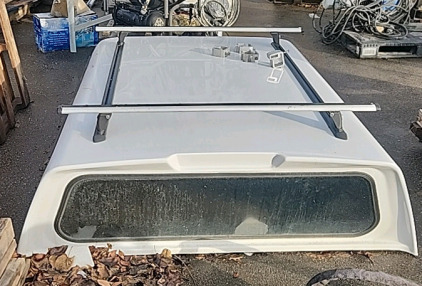 Leer Camper Shell With Bike Racks on top and Open Access On The Side..