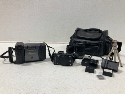 (1) LUMIX GF1 Digital Camera with 2 Battery Chargers, 3 batteries, 2 Panasonic Lenses, 2 tripods, 1 Sandisk 32GB Memory Card, And (1) Sharp Viewcam Hi-Fi Monaural Camera