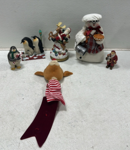 Holiday Musical Santa on Reindeer Statue, Baking Snowman Beanbag, Penguin Family Statue, &ldquo;Fill Your Hearts with Joy This Season&rdquo; Penguin Statue, Santa Holding Penguin Statue, Rudolph the Red Nose Reindeer Wall Decor