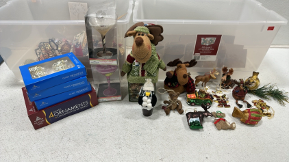 (2) Cocktail Ornaments, (4) Glass Bulb Ornaments, (18) Glass Pinecone Ornaments, Moose Themed Basket with Gold Pinecone Ornaments, Moose Plush, (6) Various Moose Ornaments, and More Assorted Christmas Decor