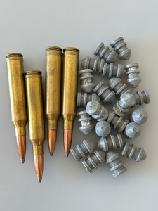 (4) Rounds of 7mm Cartridges and 45 Cal Bullets