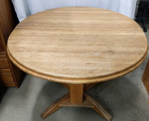 (1) Round Wooden Dining Table - 47"x41"