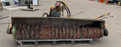 Yellow Skid Steer Sweepester