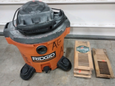 (1) 12 Gallon RIDGID ShopVac, (4) 4"x12" Home Details Wood Duct/Vent Covers (3 brand new in original packaging).