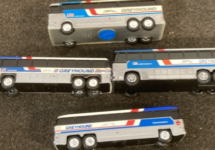 VARIETY OF VINTAGE GREYHOUND BUS TOYS.