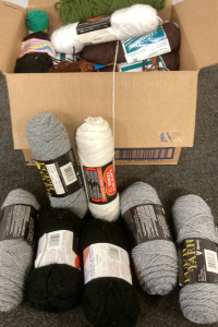 BOX WITH A VARIETY OF YARN.