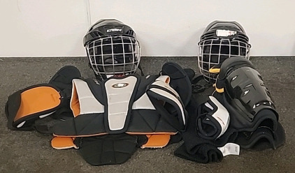 2 CCM and Bauer Youth Hockey Helmets .. Hockey Shoulder Pads .. Shin Guards. Elbow Pads