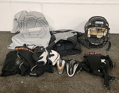 2 Youth CCM Hockey Helmet... Athletic Supporters... Elbow Pads Chest Protector...