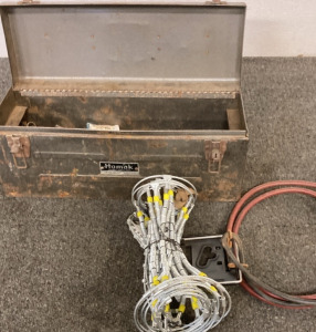 VINTAGE HOMAK METAL TOOL BOX WITH MISCELLANEOUS PARTS.