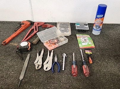 Various Tools Large Pipe Wrench. Vice Grips . Chainsaw Chains .. Wire Nuts .. and Much More