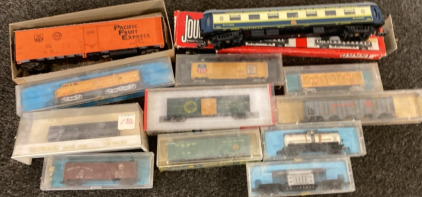VARIETY OF VINTAGE MODEL TRAIN CARS.