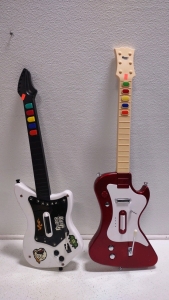 (2) PlayStation Guitars For Guitar Hero Game