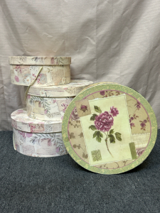 (4) Round Floral Themed Storage Boxes